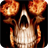 Skull with fiery eyes icon